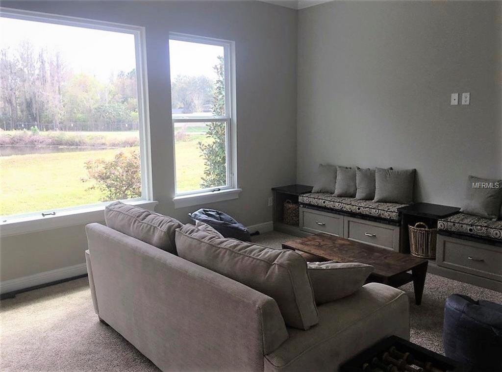 3920 COVE LAKE PLACE, LAND O LAKES, Florida 34639, 4 Bedrooms Bedrooms, 9 Rooms Rooms,3 BathroomsBathrooms,Residential,For sale,COVE LAKE,T2925918