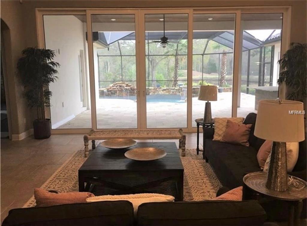 3920 COVE LAKE PLACE, LAND O LAKES, Florida 34639, 4 Bedrooms Bedrooms, 9 Rooms Rooms,3 BathroomsBathrooms,Residential,For sale,COVE LAKE,T2925918