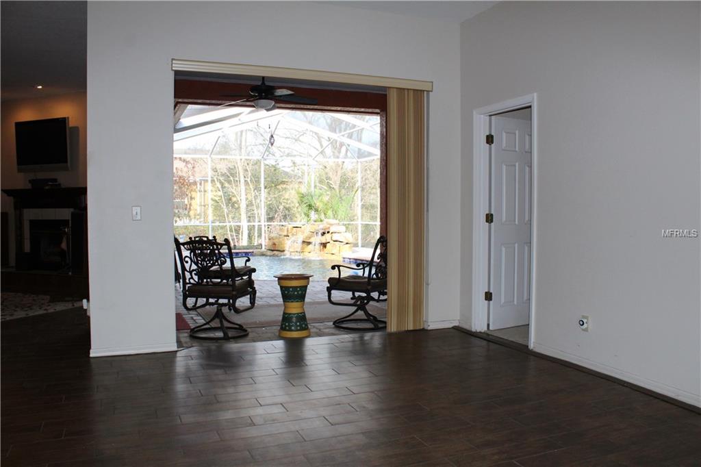 3827 REDWOOD DRIVE, LAND O LAKES, Florida 34639, 5 Bedrooms Bedrooms, 10 Rooms Rooms,3 BathroomsBathrooms,Residential,For sale,REDWOOD,T2928126