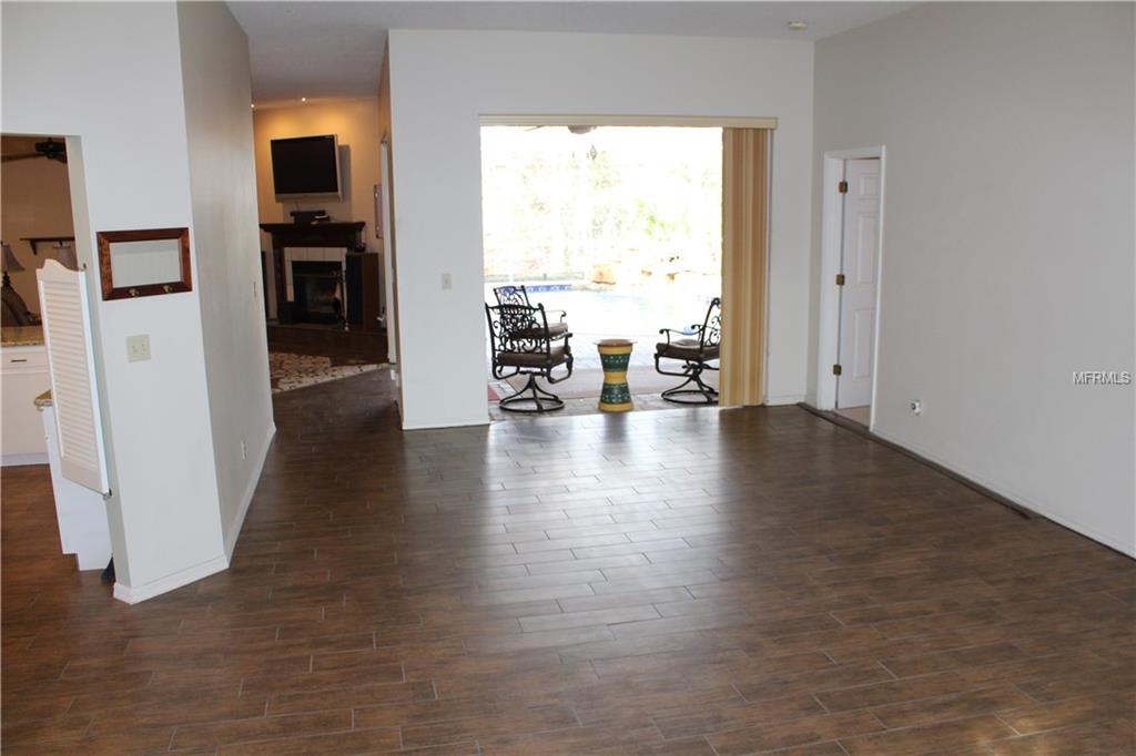 3827 REDWOOD DRIVE, LAND O LAKES, Florida 34639, 5 Bedrooms Bedrooms, 10 Rooms Rooms,3 BathroomsBathrooms,Residential,For sale,REDWOOD,T2928126