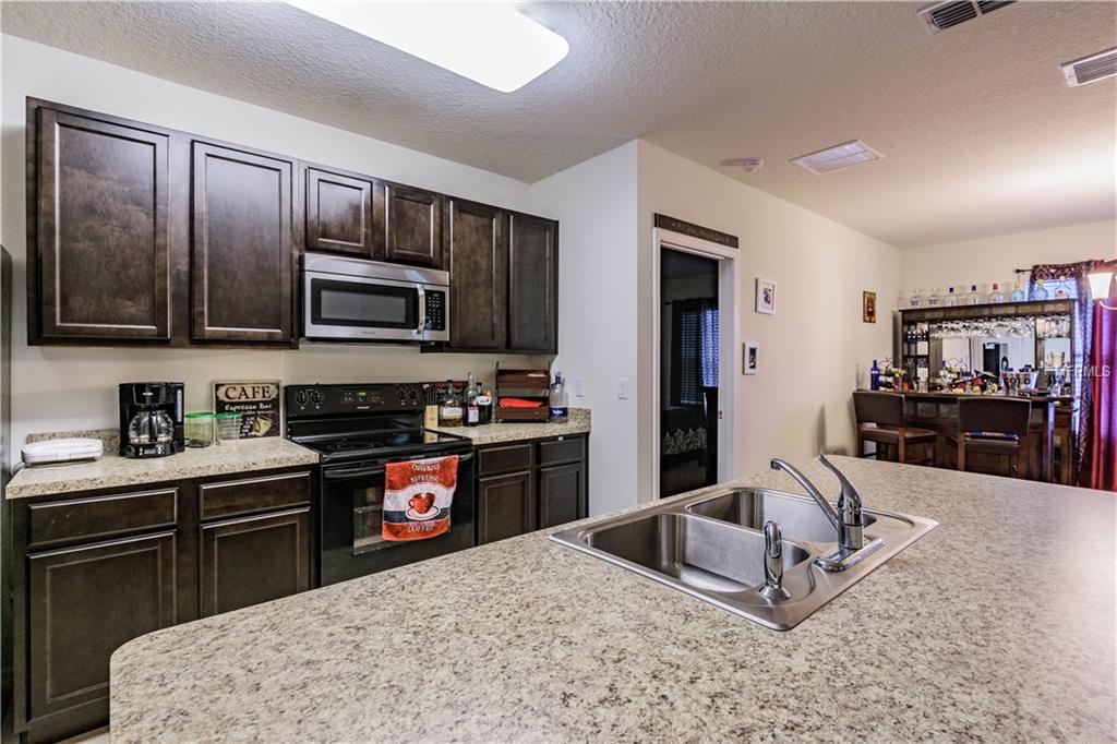 138 TRACY CIRCLE, HAINES CITY, Florida 33844, 3 Bedrooms Bedrooms, 5 Rooms Rooms,2 BathroomsBathrooms,Residential,For sale,TRACY,O5554575