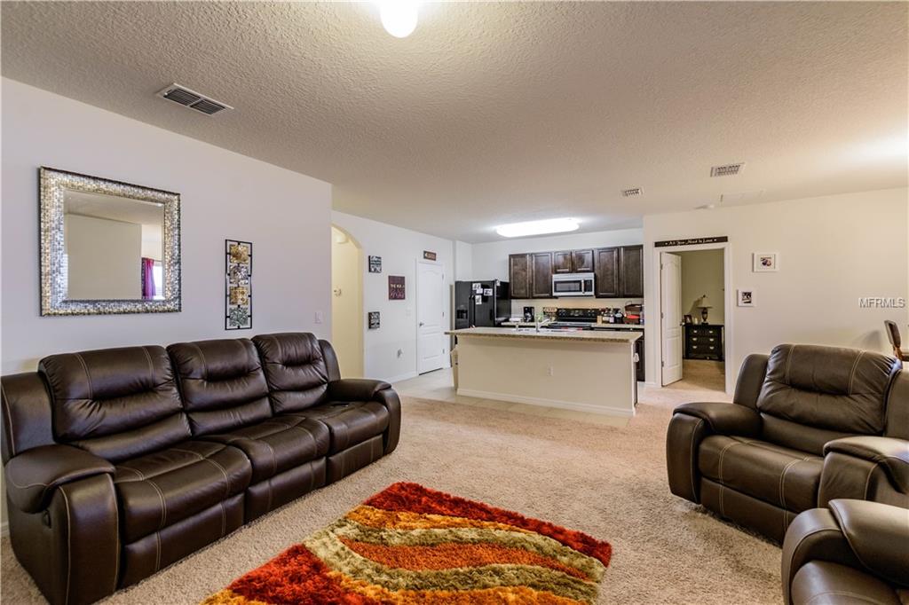 138 TRACY CIRCLE, HAINES CITY, Florida 33844, 3 Bedrooms Bedrooms, 5 Rooms Rooms,2 BathroomsBathrooms,Residential,For sale,TRACY,O5554575