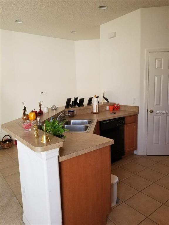 14545 HUNTCLIFF PARK WAY, ORLANDO, Florida 32824, 3 Bedrooms Bedrooms, 5 Rooms Rooms,2 BathroomsBathrooms,Residential,For sale,HUNTCLIFF PARK,O5554581