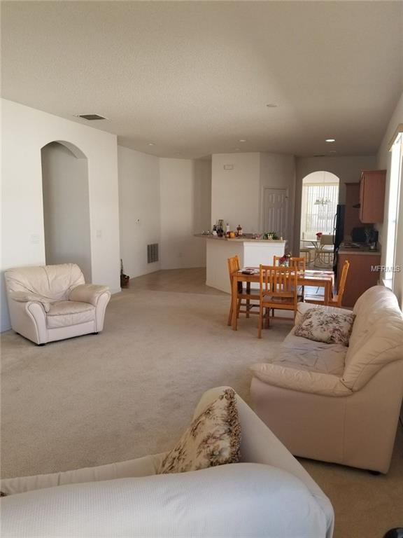 14545 HUNTCLIFF PARK WAY, ORLANDO, Florida 32824, 3 Bedrooms Bedrooms, 5 Rooms Rooms,2 BathroomsBathrooms,Residential,For sale,HUNTCLIFF PARK,O5554581