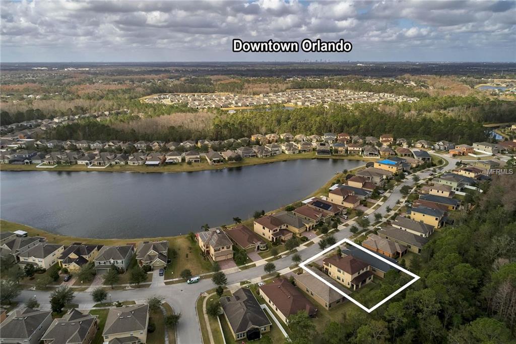 10718 WILLOW RIDGE LOOP, ORLANDO, Florida 32825, 4 Bedrooms Bedrooms, 8 Rooms Rooms,3 BathroomsBathrooms,Residential,For sale,WILLOW RIDGE,O5559885