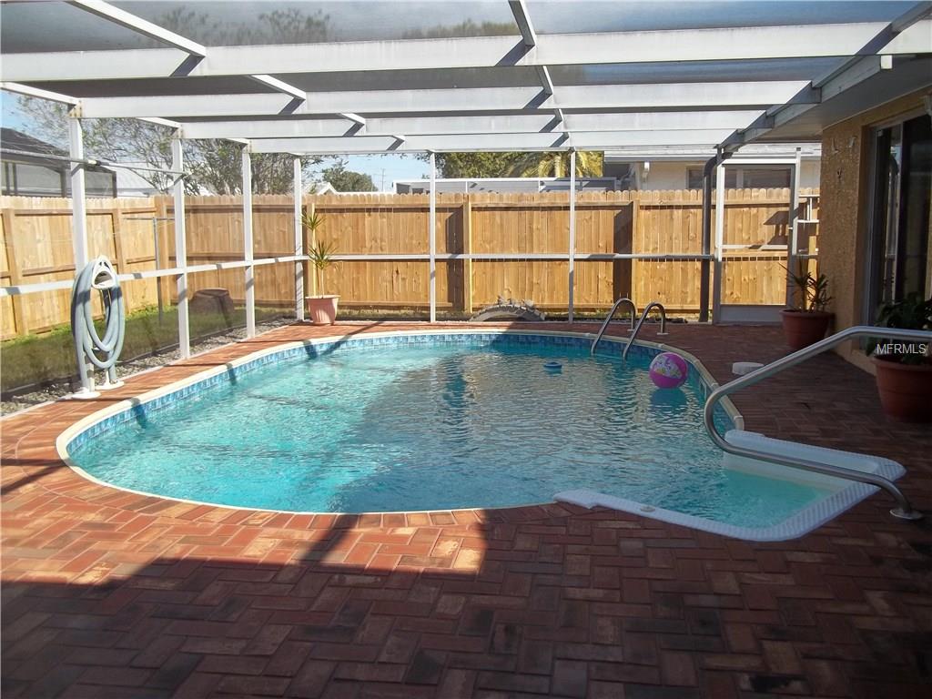 7523 LOTUS DRIVE, PORT RICHEY, Florida 34668, 4 Bedrooms Bedrooms, 3 Rooms Rooms,2 BathroomsBathrooms,Residential,For sale,LOTUS,W7636359