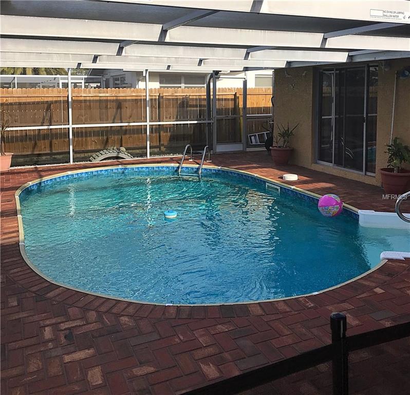 7523 LOTUS DRIVE, PORT RICHEY, Florida 34668, 4 Bedrooms Bedrooms, 3 Rooms Rooms,2 BathroomsBathrooms,Residential,For sale,LOTUS,W7636359