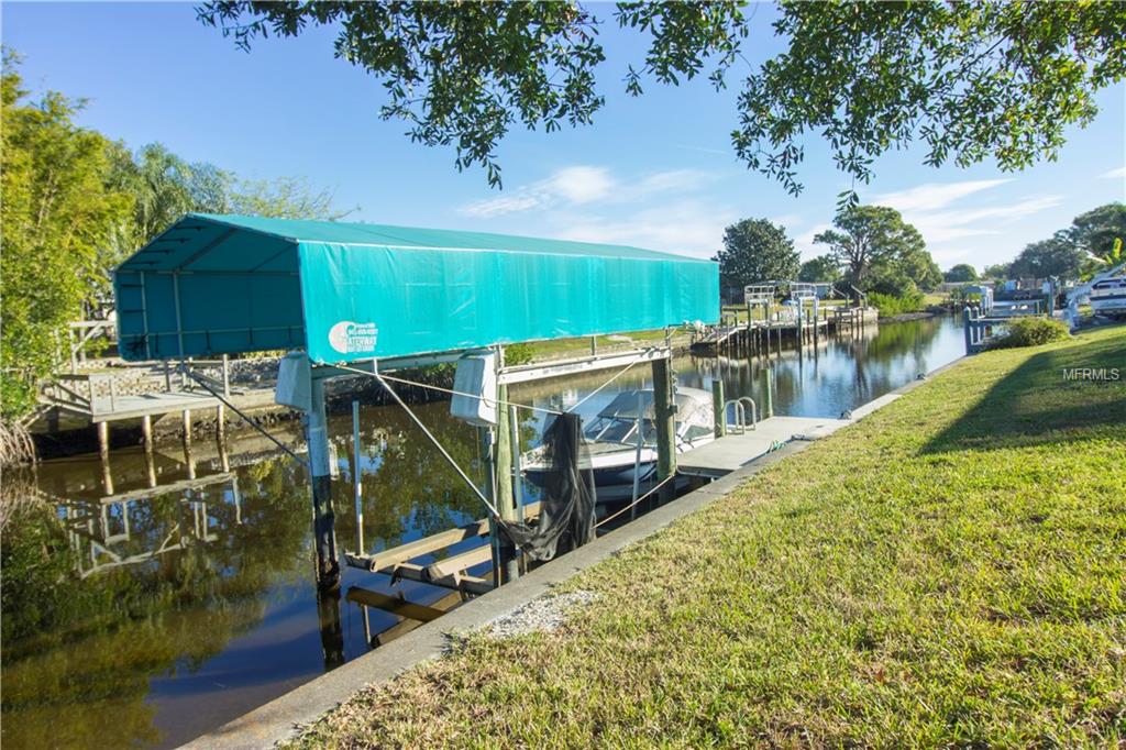 152 BEDFORD DRIVE NE, PORT CHARLOTTE, Florida 33952, 3 Bedrooms Bedrooms, 7 Rooms Rooms,2 BathroomsBathrooms,Residential,For sale,BEDFORD,C7247421