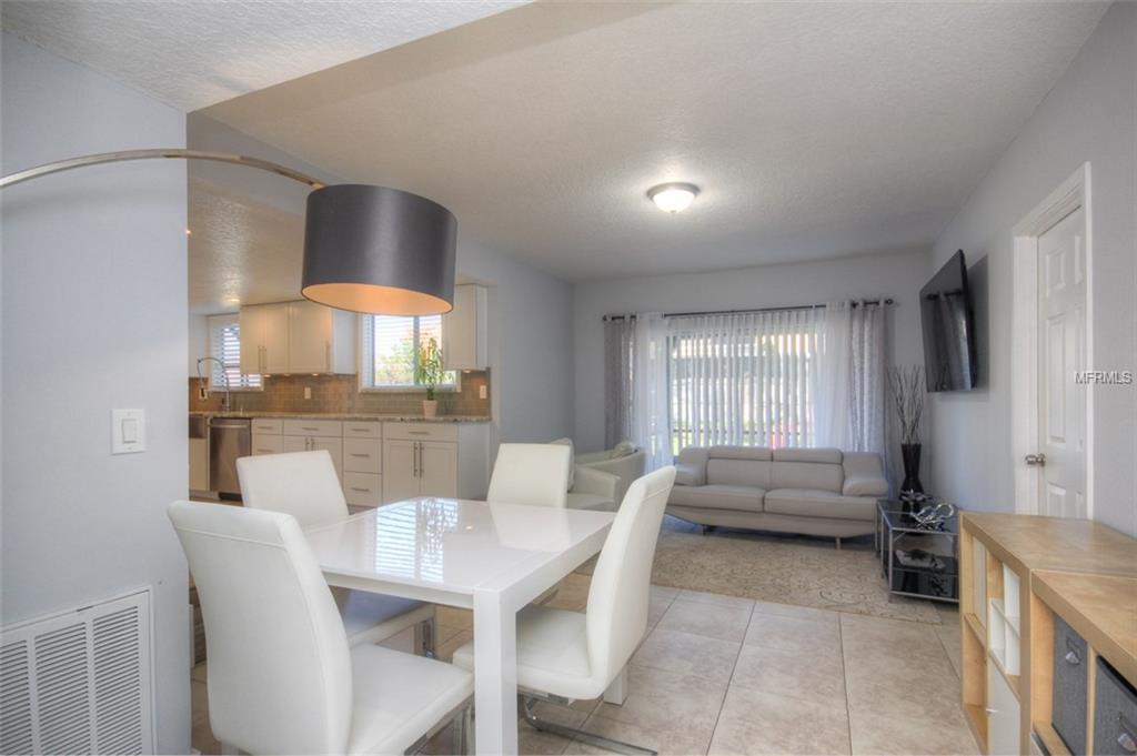 3921 STONEHAVEN ROAD, ORLANDO, Florida 32817, 4 Bedrooms Bedrooms, 7 Rooms Rooms,3 BathroomsBathrooms,Residential,For sale,STONEHAVEN,O5561687