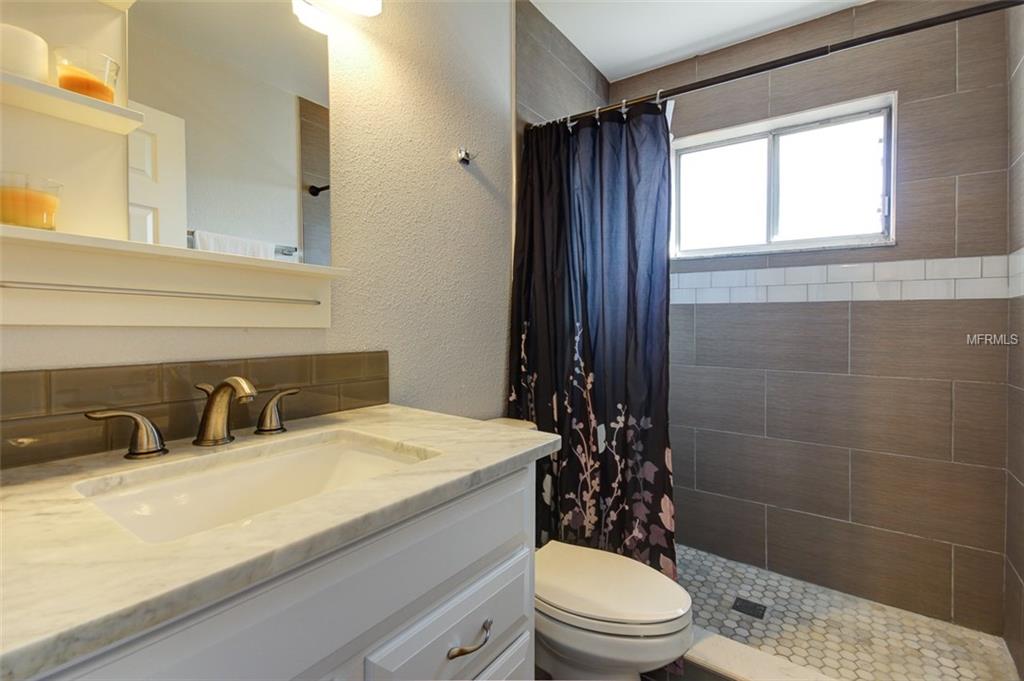 3921 STONEHAVEN ROAD, ORLANDO, Florida 32817, 4 Bedrooms Bedrooms, 7 Rooms Rooms,3 BathroomsBathrooms,Residential,For sale,STONEHAVEN,O5561687