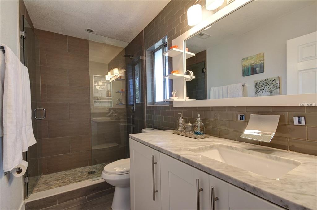 3921 STONEHAVEN ROAD, ORLANDO, Florida 32817, 4 Bedrooms Bedrooms, 7 Rooms Rooms,3 BathroomsBathrooms,Residential,For sale,STONEHAVEN,O5561687