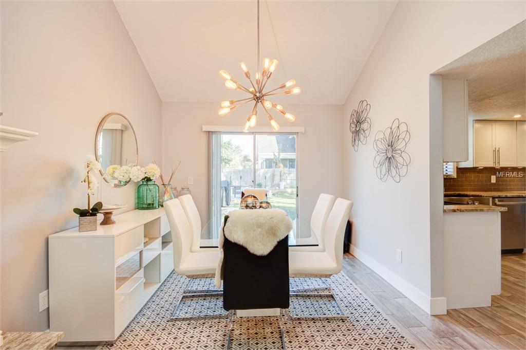 3921 STONEHAVEN ROAD, ORLANDO, Florida 32817, 4 Bedrooms Bedrooms, 7 Rooms Rooms,3 BathroomsBathrooms,Residential,For sale,STONEHAVEN,O5561687