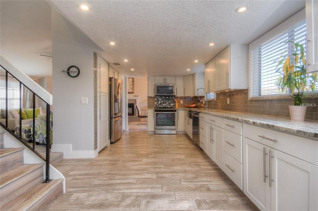 3921 STONEHAVEN ROAD, ORLANDO, Florida 32817, 4 Bedrooms Bedrooms, 7 Rooms Rooms,3 BathroomsBathrooms,Residential,For sale,STONEHAVEN,O5561687