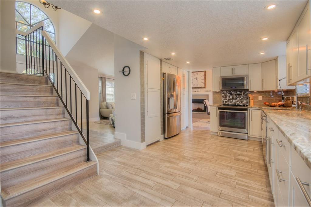 3921 STONEHAVEN ROAD, ORLANDO, Florida 32817, 4 Bedrooms Bedrooms, 7 Rooms Rooms,3 BathroomsBathrooms,Residential,For sale,STONEHAVEN,O5561687