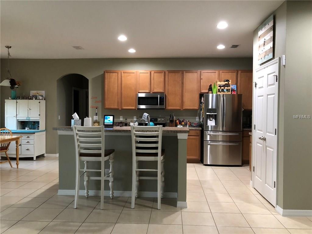 715 BAINBRIDGE LOOP, WINTER GARDEN, Florida 34787, 4 Bedrooms Bedrooms, 10 Rooms Rooms,3 BathroomsBathrooms,Residential,For sale,BAINBRIDGE,O5553277