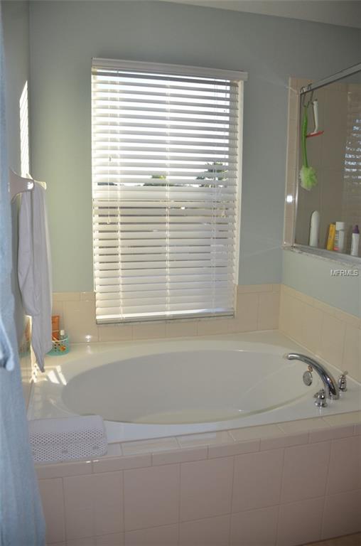 715 BAINBRIDGE LOOP, WINTER GARDEN, Florida 34787, 4 Bedrooms Bedrooms, 10 Rooms Rooms,3 BathroomsBathrooms,Residential,For sale,BAINBRIDGE,O5553277