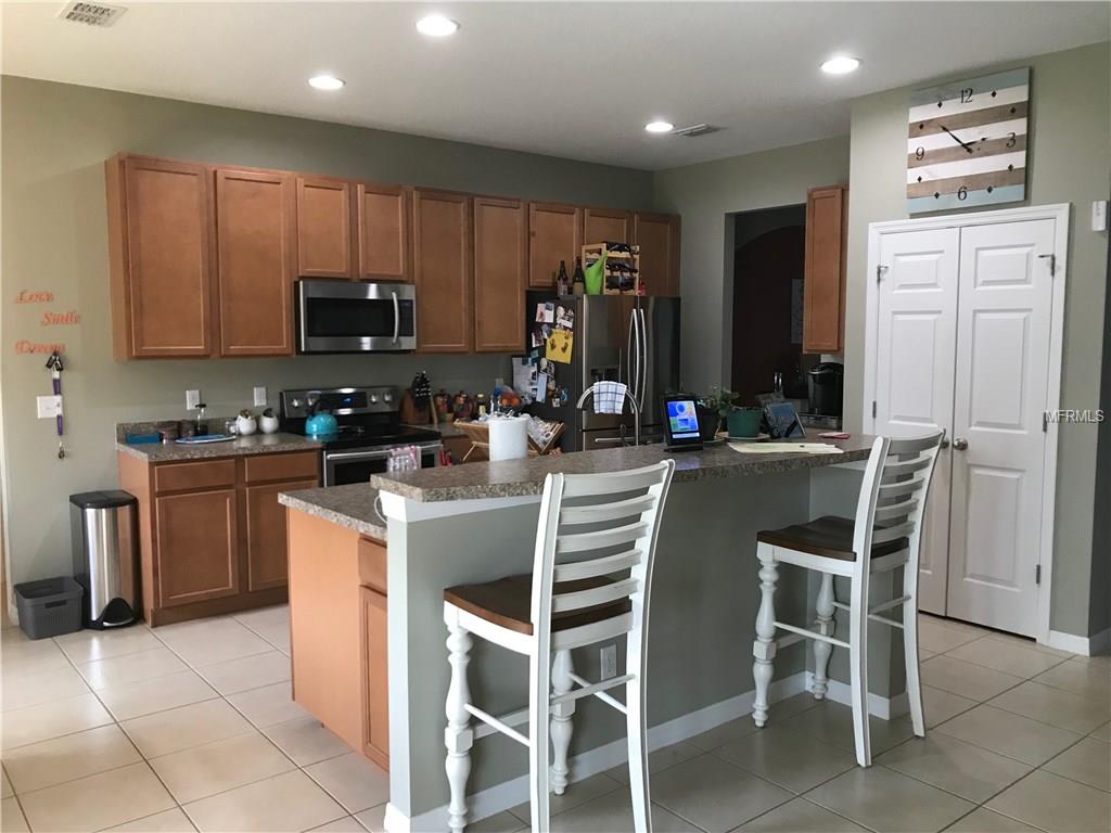 715 BAINBRIDGE LOOP, WINTER GARDEN, Florida 34787, 4 Bedrooms Bedrooms, 10 Rooms Rooms,3 BathroomsBathrooms,Residential,For sale,BAINBRIDGE,O5553277
