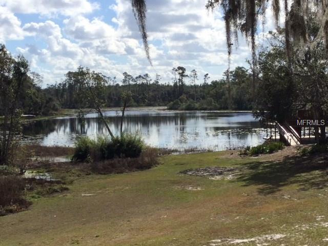 4490 CAVE LAKE ROAD, DE LEON SPRINGS, Florida 32130, 4 Bedrooms Bedrooms, 7 Rooms Rooms,3 BathroomsBathrooms,Residential,For sale,CAVE LAKE,V4722484