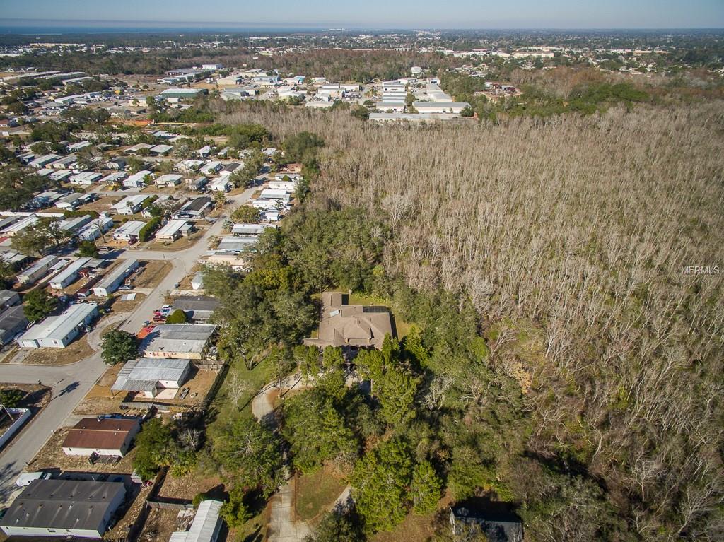 6701 BANDURA AVENUE, NEW PORT RICHEY, Florida 34653, 4 Bedrooms Bedrooms, 10 Rooms Rooms,4 BathroomsBathrooms,Residential,For sale,BANDURA,W7636973