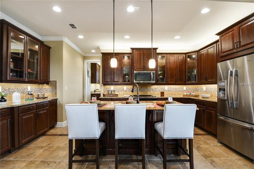 2405 CHATEAU LOOP, KISSIMMEE, Florida 34741, 4 Bedrooms Bedrooms, 3 Rooms Rooms,2 BathroomsBathrooms,Residential,For sale,CHATEAU,O5561358