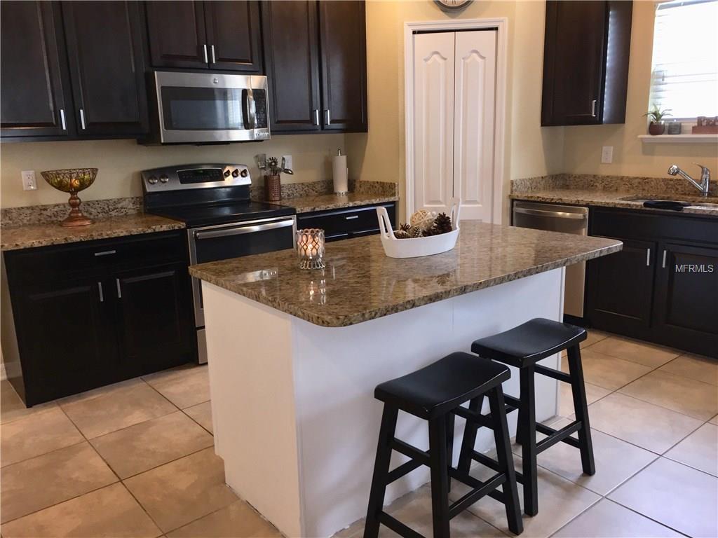 2881 MOONSTONE BEND, KISSIMMEE, Florida 34758, 3 Bedrooms Bedrooms, 7 Rooms Rooms,2 BathroomsBathrooms,Residential,For sale,MOONSTONE,O5559347