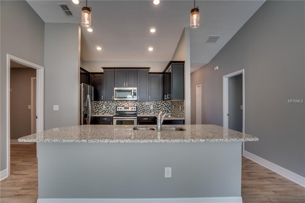 78 N OAK AVENUE, UMATILLA, Florida 32784, 4 Bedrooms Bedrooms, 3 Rooms Rooms,2 BathroomsBathrooms,Residential,For sale,OAK,O5544423