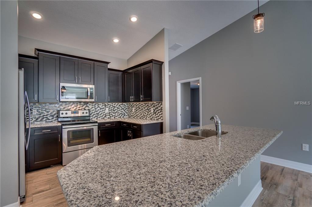 78 N OAK AVENUE, UMATILLA, Florida 32784, 4 Bedrooms Bedrooms, 3 Rooms Rooms,2 BathroomsBathrooms,Residential,For sale,OAK,O5544423