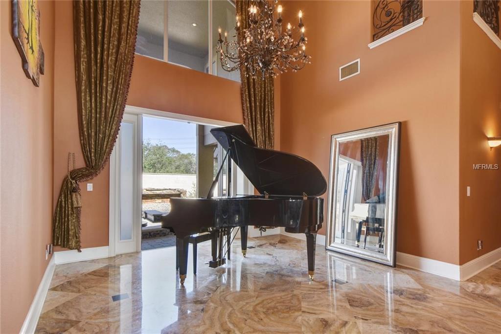 1951 ELKHORN COURT, LONGWOOD, Florida 32750, 5 Bedrooms Bedrooms, 10 Rooms Rooms,4 BathroomsBathrooms,Residential,For sale,ELKHORN,O5561562