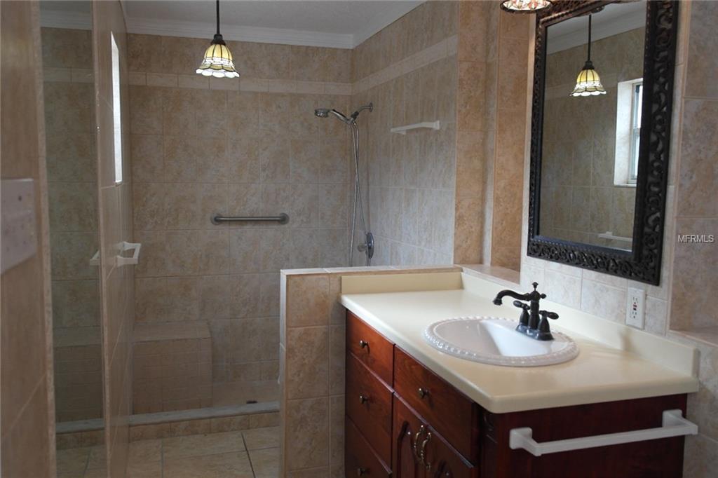 1465 GRAND CAYMAN CIRCLE, WINTER HAVEN, Florida 33884, 3 Bedrooms Bedrooms, 8 Rooms Rooms,2 BathroomsBathrooms,Residential,For sale,GRAND CAYMAN,P4719038