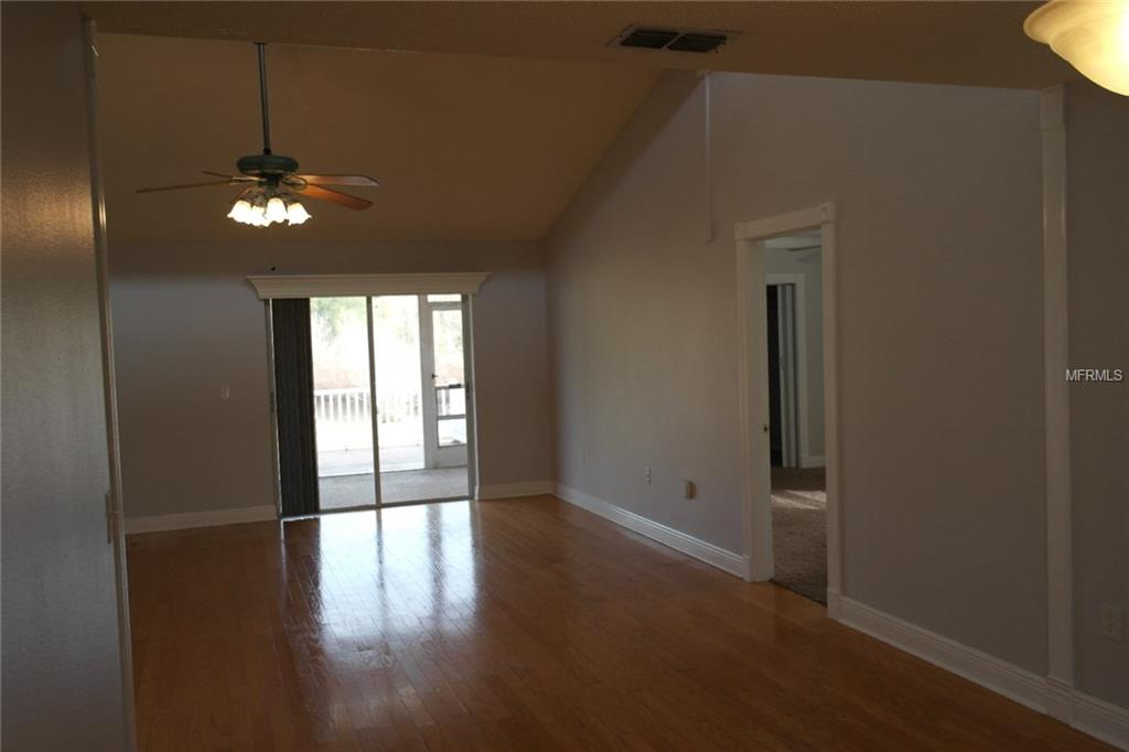 1465 GRAND CAYMAN CIRCLE, WINTER HAVEN, Florida 33884, 3 Bedrooms Bedrooms, 8 Rooms Rooms,2 BathroomsBathrooms,Residential,For sale,GRAND CAYMAN,P4719038