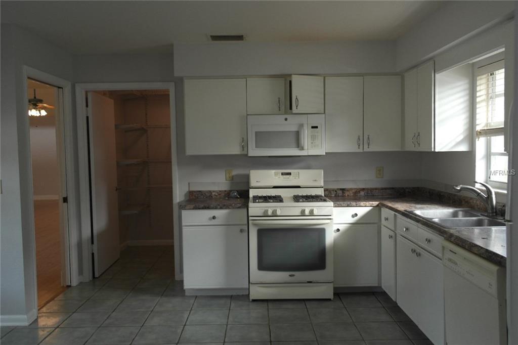 1465 GRAND CAYMAN CIRCLE, WINTER HAVEN, Florida 33884, 3 Bedrooms Bedrooms, 8 Rooms Rooms,2 BathroomsBathrooms,Residential,For sale,GRAND CAYMAN,P4719038