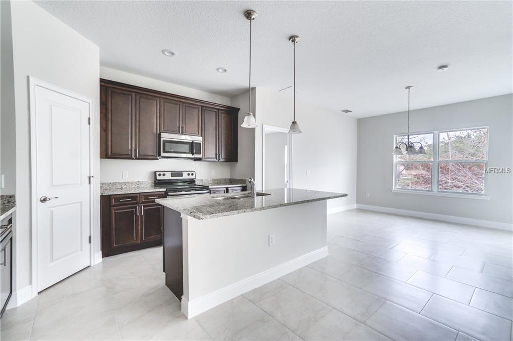 386 BEGONIA COURT, POINCIANA, Florida 34759, 3 Bedrooms Bedrooms, 3 Rooms Rooms,2 BathroomsBathrooms,Residential,For sale,BEGONIA,O5544473