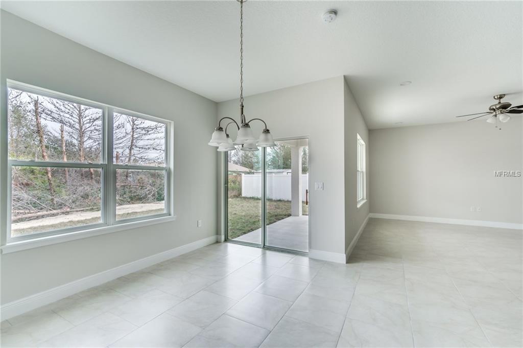 386 BEGONIA COURT, POINCIANA, Florida 34759, 3 Bedrooms Bedrooms, 3 Rooms Rooms,2 BathroomsBathrooms,Residential,For sale,BEGONIA,O5544473