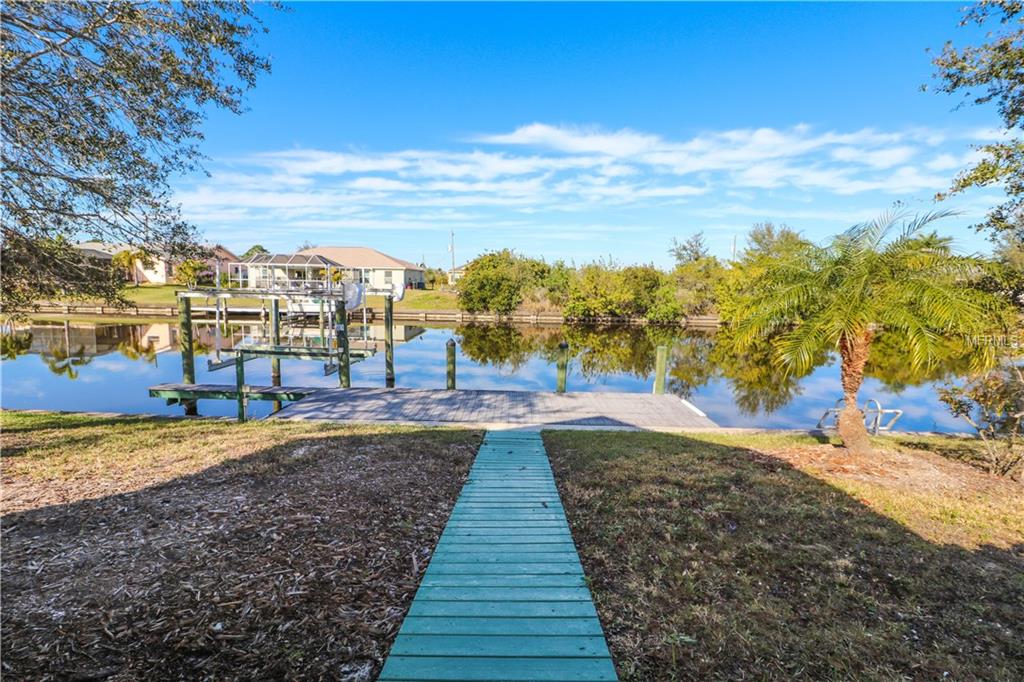 9206 ROSEBUD CIRCLE, PORT CHARLOTTE, Florida 33981, 3 Bedrooms Bedrooms, 6 Rooms Rooms,2 BathroomsBathrooms,Residential,For sale,ROSEBUD,D5922436