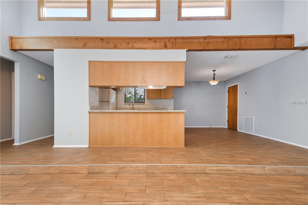 5212 SPRINGSIDE COURT, ORLANDO, Florida 32819, 3 Bedrooms Bedrooms, 6 Rooms Rooms,2 BathroomsBathrooms,Residential,For sale,SPRINGSIDE,O5551493