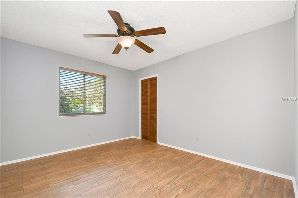 5212 SPRINGSIDE COURT, ORLANDO, Florida 32819, 3 Bedrooms Bedrooms, 6 Rooms Rooms,2 BathroomsBathrooms,Residential,For sale,SPRINGSIDE,O5551493