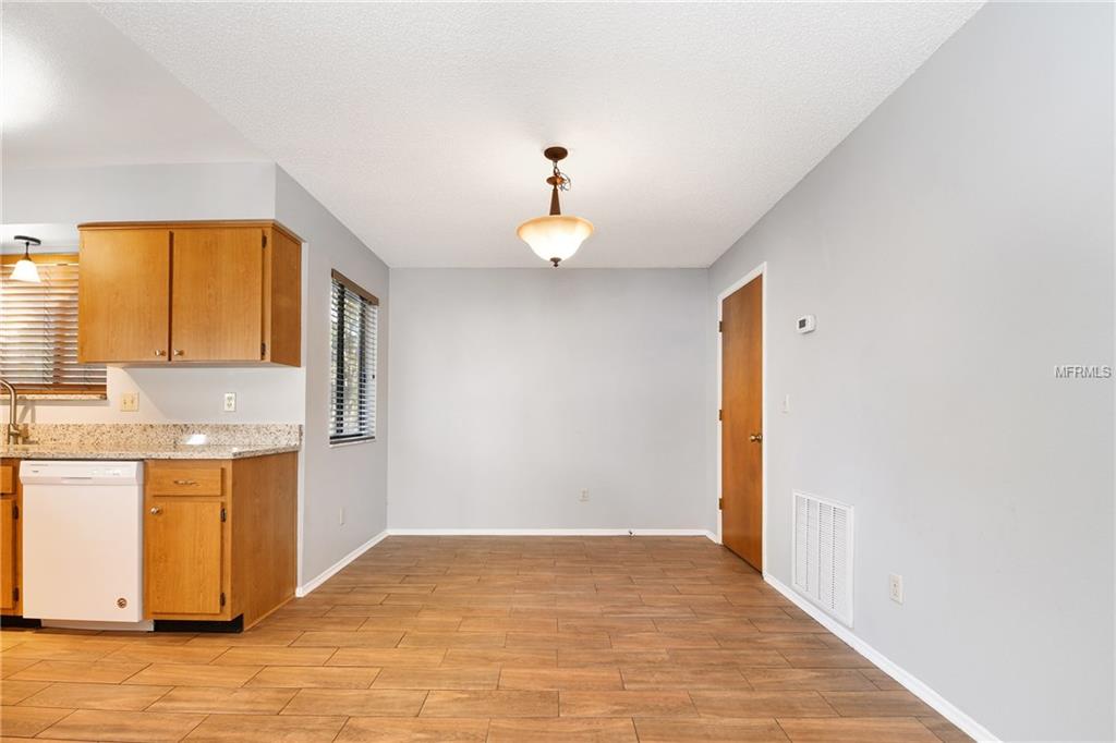 5212 SPRINGSIDE COURT, ORLANDO, Florida 32819, 3 Bedrooms Bedrooms, 6 Rooms Rooms,2 BathroomsBathrooms,Residential,For sale,SPRINGSIDE,O5551493