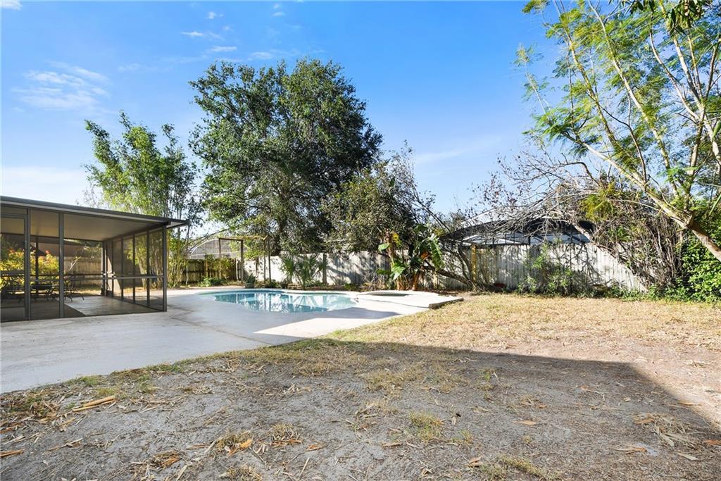 5212 SPRINGSIDE COURT, ORLANDO, Florida 32819, 3 Bedrooms Bedrooms, 6 Rooms Rooms,2 BathroomsBathrooms,Residential,For sale,SPRINGSIDE,O5551493