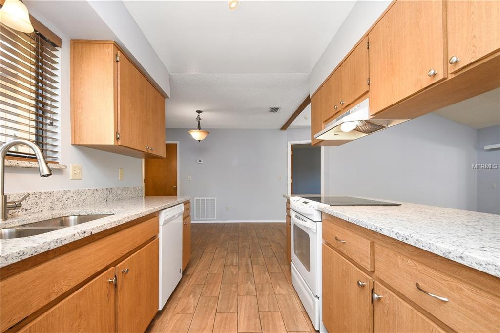 5212 SPRINGSIDE COURT, ORLANDO, Florida 32819, 3 Bedrooms Bedrooms, 6 Rooms Rooms,2 BathroomsBathrooms,Residential,For sale,SPRINGSIDE,O5551493