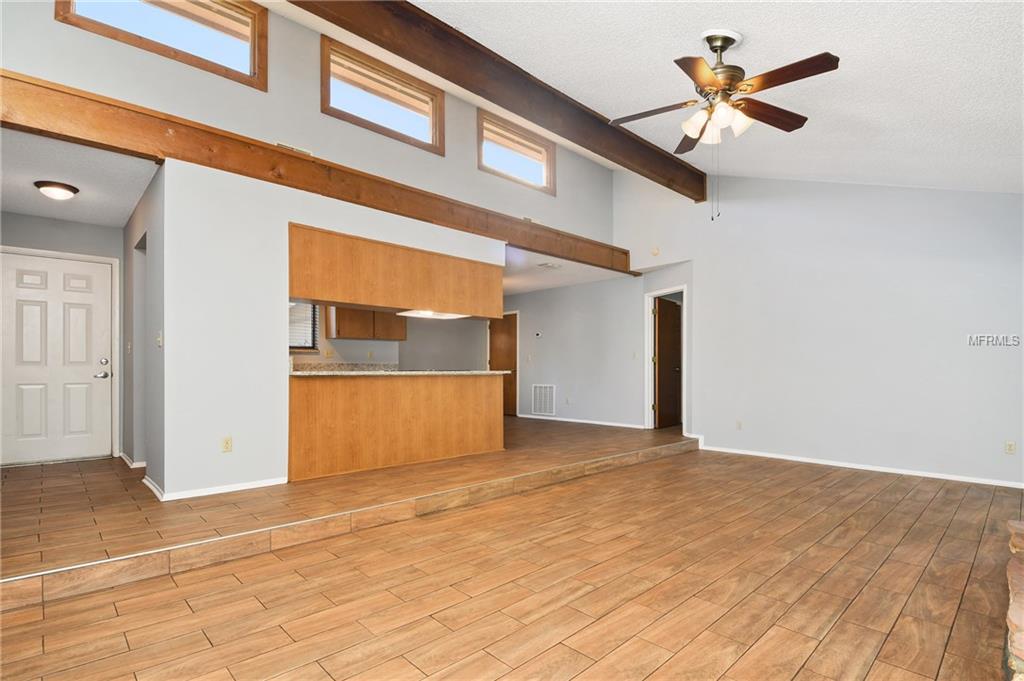 5212 SPRINGSIDE COURT, ORLANDO, Florida 32819, 3 Bedrooms Bedrooms, 6 Rooms Rooms,2 BathroomsBathrooms,Residential,For sale,SPRINGSIDE,O5551493