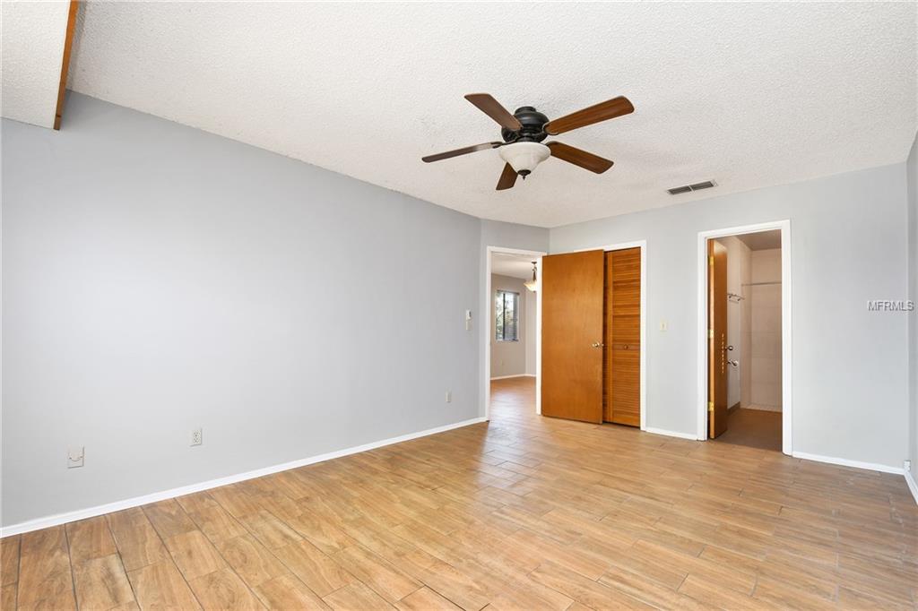 5212 SPRINGSIDE COURT, ORLANDO, Florida 32819, 3 Bedrooms Bedrooms, 6 Rooms Rooms,2 BathroomsBathrooms,Residential,For sale,SPRINGSIDE,O5551493