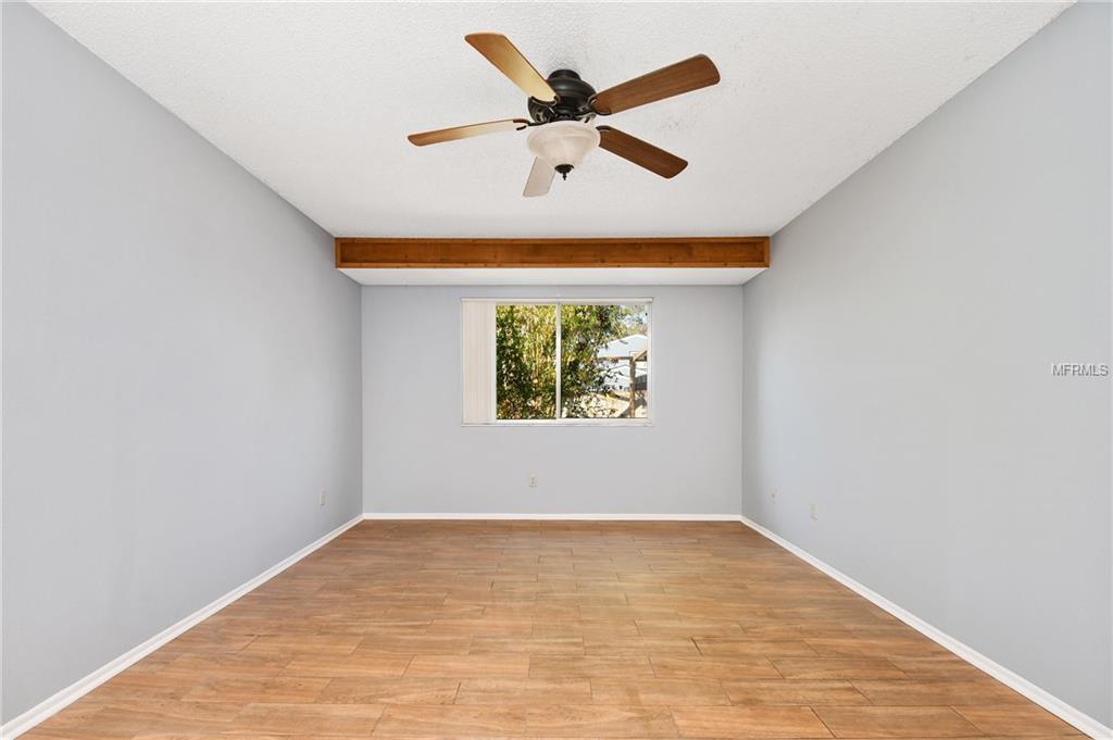 5212 SPRINGSIDE COURT, ORLANDO, Florida 32819, 3 Bedrooms Bedrooms, 6 Rooms Rooms,2 BathroomsBathrooms,Residential,For sale,SPRINGSIDE,O5551493