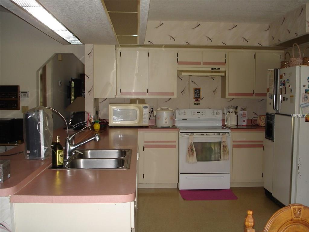 7824 TROPICAIRE BOULEVARD, NORTH PORT, Florida 34291, 4 Bedrooms Bedrooms, 10 Rooms Rooms,2 BathroomsBathrooms,Residential,For sale,TROPICAIRE,C7246702