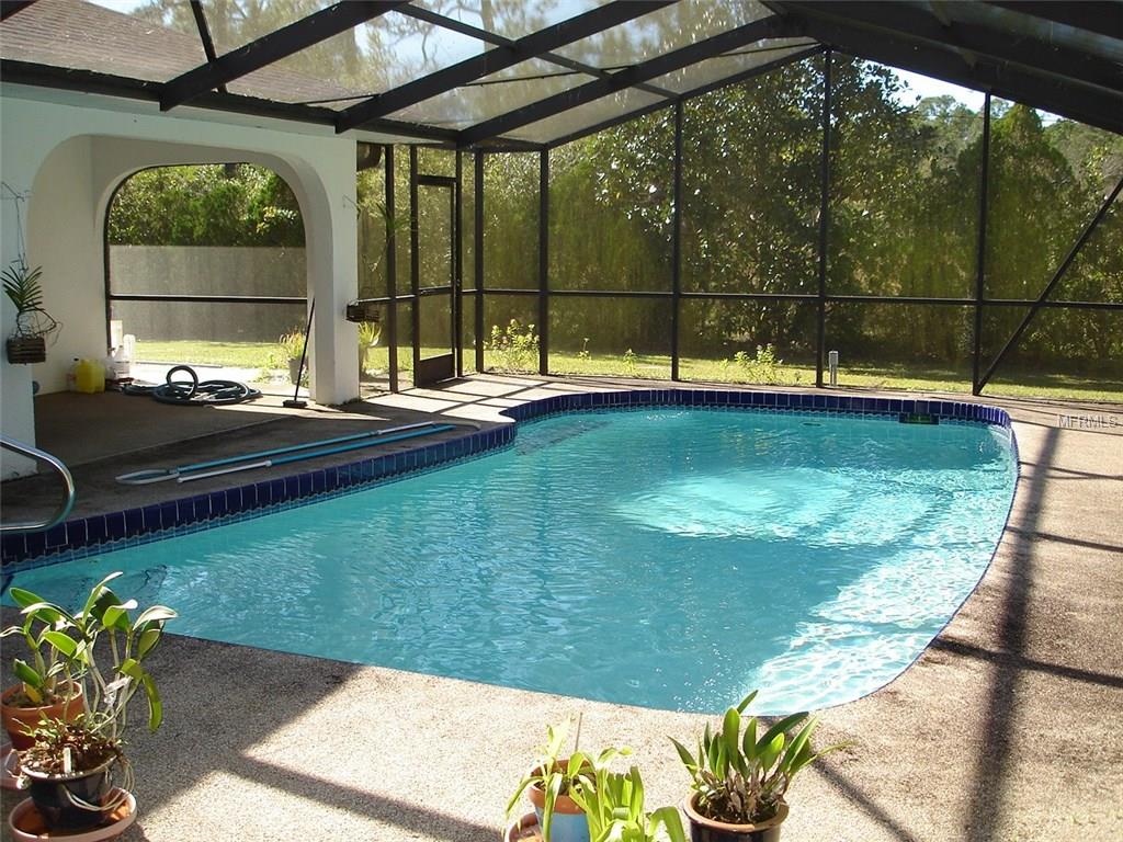 7824 TROPICAIRE BOULEVARD, NORTH PORT, Florida 34291, 4 Bedrooms Bedrooms, 10 Rooms Rooms,2 BathroomsBathrooms,Residential,For sale,TROPICAIRE,C7246702