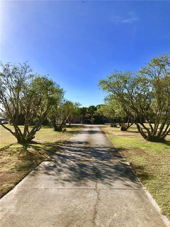 1961 FOXHOLLOW DRIVE E, AUBURNDALE, Florida 33823, 3 Bedrooms Bedrooms, 8 Rooms Rooms,2 BathroomsBathrooms,Residential,For sale,FOXHOLLOW,P4718674
