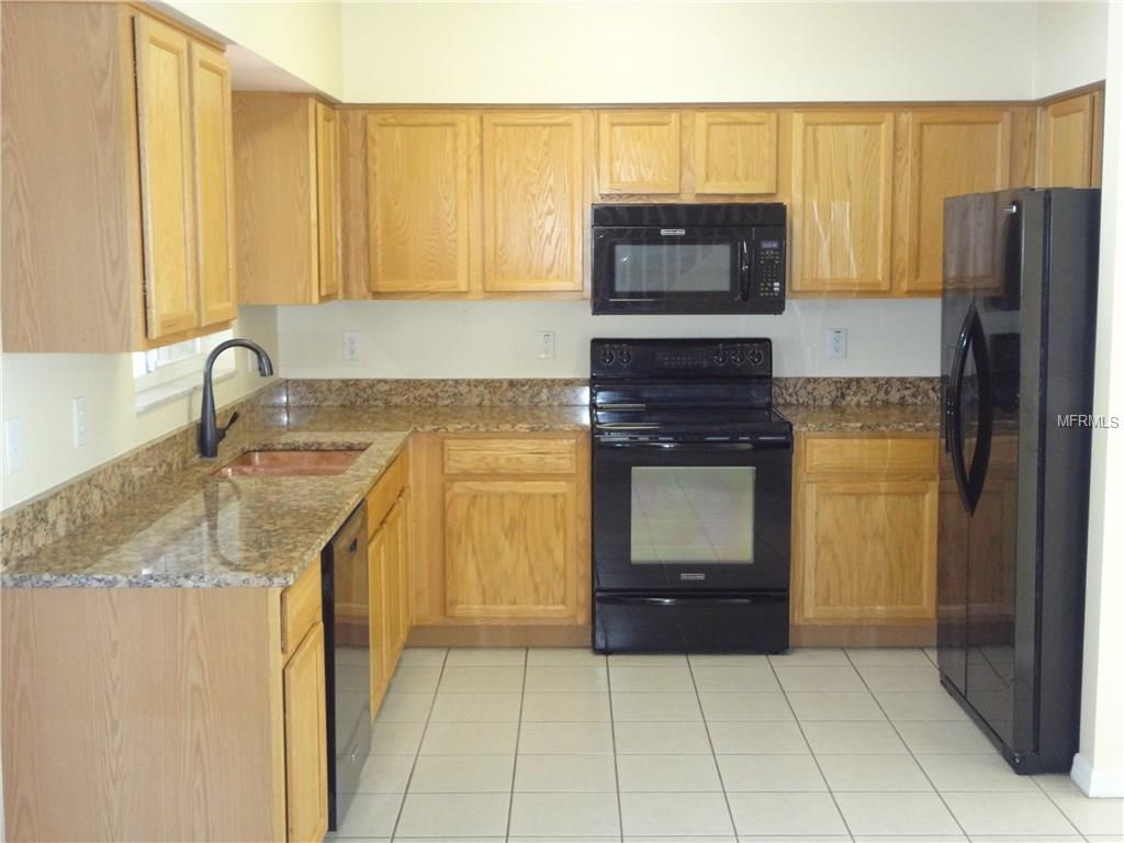 31001 MIDTOWN COURT, WESLEY CHAPEL, Florida 33545, 3 Bedrooms Bedrooms, 6 Rooms Rooms,2 BathroomsBathrooms,Residential,For sale,MIDTOWN,E2205441