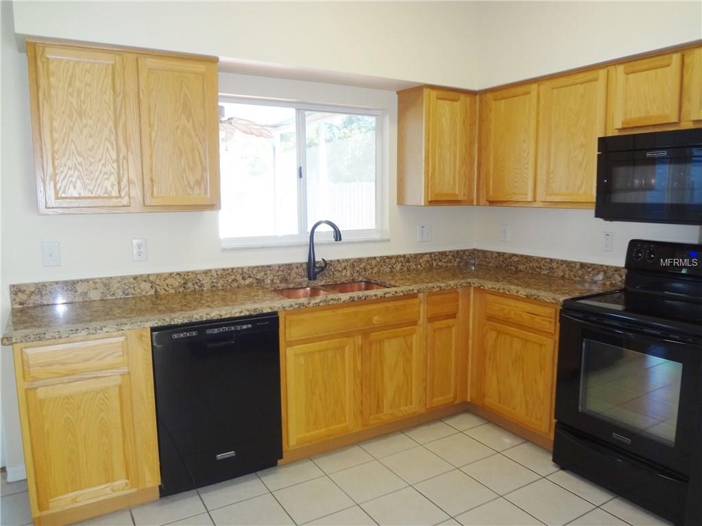 31001 MIDTOWN COURT, WESLEY CHAPEL, Florida 33545, 3 Bedrooms Bedrooms, 6 Rooms Rooms,2 BathroomsBathrooms,Residential,For sale,MIDTOWN,E2205441