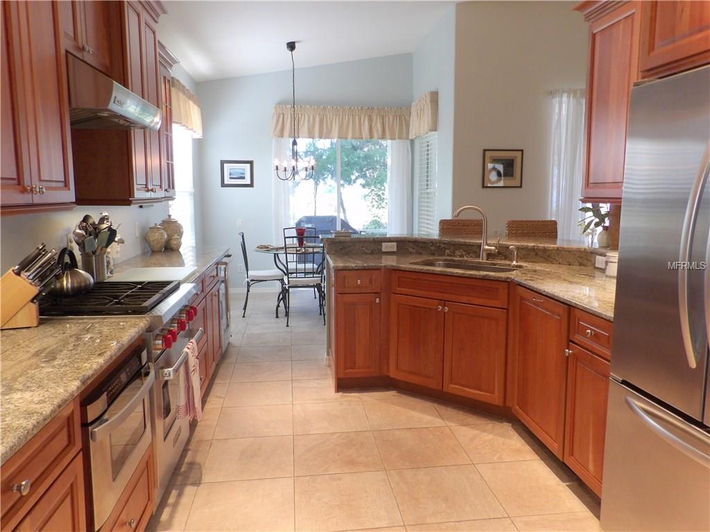 8410 IDLEWOOD COURT, LAKEWOOD RANCH, Florida 34202, 3 Bedrooms Bedrooms, 7 Rooms Rooms,2 BathroomsBathrooms,Residential,For sale,IDLEWOOD,A4204211
