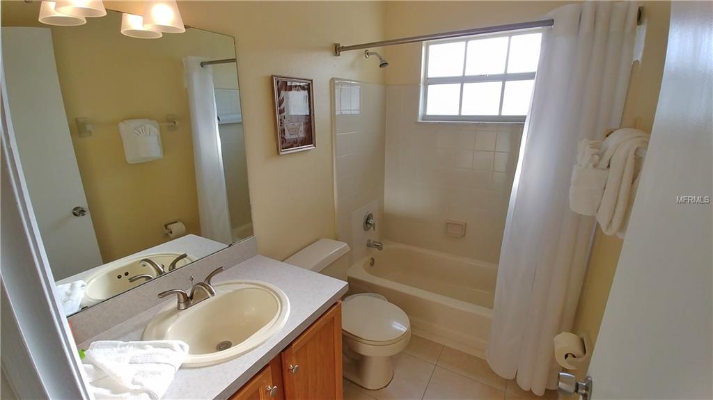 5014 LAGUNA BAY CIRCLE, KISSIMMEE, Florida 34746, 3 Bedrooms Bedrooms, 3 Rooms Rooms,2 BathroomsBathrooms,Residential,For sale,LAGUNA BAY,O5553365