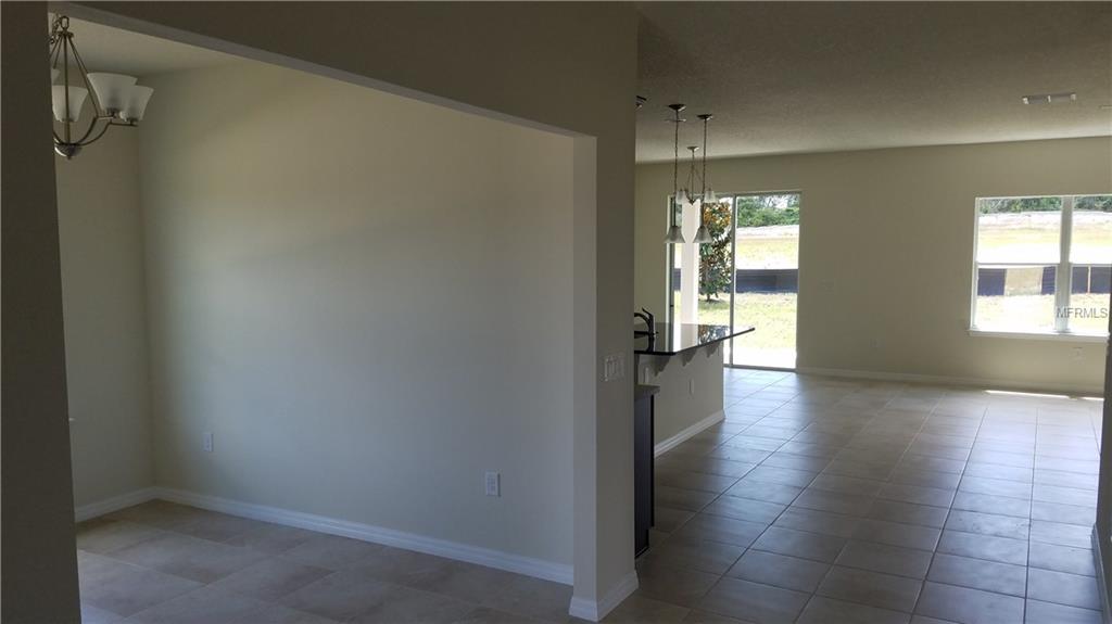 1012 GLAZEBROOK LOOP, ORANGE CITY, Florida 32763, 3 Bedrooms Bedrooms, 7 Rooms Rooms,2 BathroomsBathrooms,Residential,For sale,GLAZEBROOK,W7636629